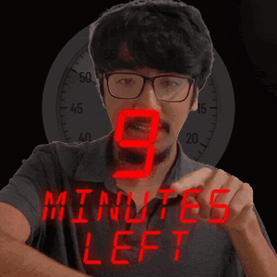 A Man With Glasses And A Beard Is Wearing A Wristwatch That Says 9 Minutes Left GIF