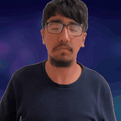 A Man With Glasses And A Beard Making A Surprised Face GIF