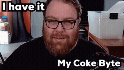 A Man With Glasses And A Beard Says " I Have It " GIF