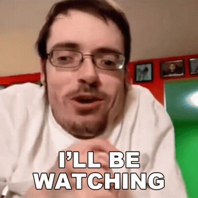 A Man With Glasses And A Beard Says I 'Ll Be Watching GIF
