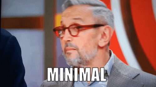 A Man With Glasses And A Beard Says " Minimal " GIF