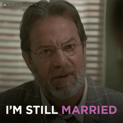 A Man With Glasses And A Beard Says That He Is Still Married GIF