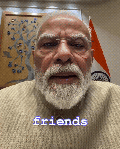 A Man With Glasses And A Beard Says The Word Friends GIF