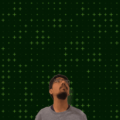 A Man With Glasses And A Beard Stands In Front Of A Green Background With The Number 17 On It GIF