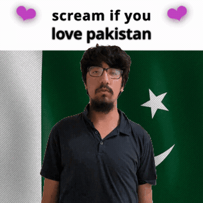 A Man With Glasses And A Beard Stands In Front Of A Pakistan Flag GIF