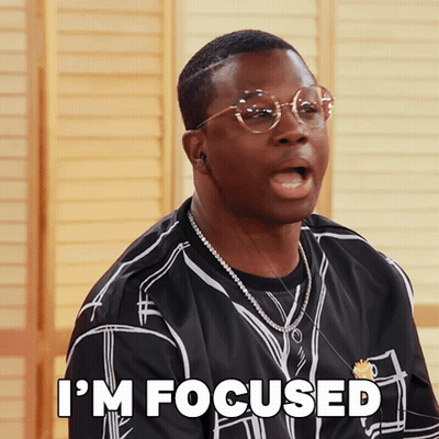 A Man With Glasses And A Black Shirt Says I 'M Focused GIF