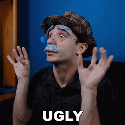 A Man With Glasses And A Fake Mustache Has The Word Ugly On The Bottom GIF