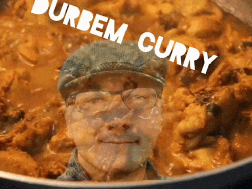 A Man With Glasses And A Hat Is In A Pot Of Curry With The Words Durbem Curry Above Him GIF
