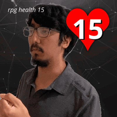 A Man With Glasses And A Heart That Says 15 On It GIF