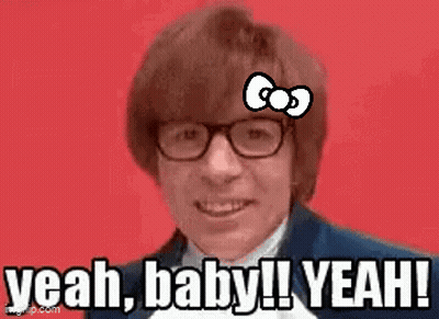A Man With Glasses And A Hello Kitty Bow On His Forehead Is Saying Yeah Baby ! Yeah ! GIF
