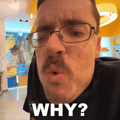 A Man With Glasses And A Mustache Is Asking The Question Why GIF