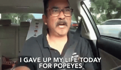 A Man With Glasses And A Mustache Is Driving A Car And Says `` I Gave Up My Life Today For Popeye '' . GIF