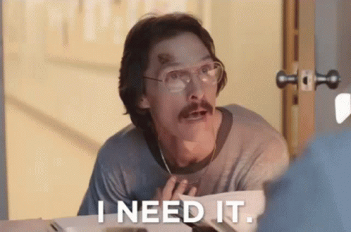 A Man With Glasses And A Mustache Is Looking At Himself In The Mirror And Says I Need It . GIF