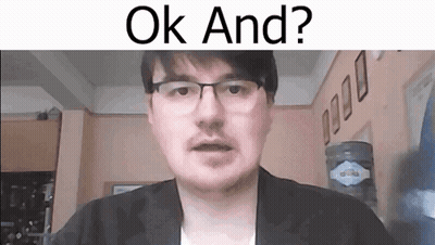 A Man With Glasses And A Mustache Is Looking At The Camera And Says `` Ok And ? '' . GIF