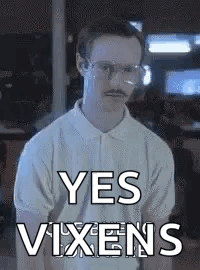 A Man With Glasses And A Mustache Is Making A Funny Face And Saying Yes Vixens . GIF