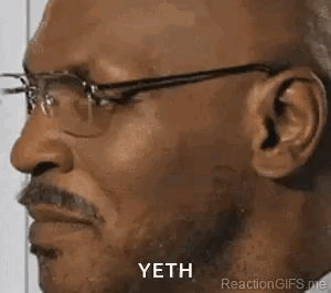 A Man With Glasses And A Mustache Is Making A Funny Face And Saying Yeth . GIF