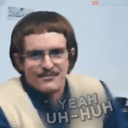 A Man With Glasses And A Mustache Is Saying Yeah Uh Huh GIF