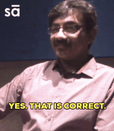A Man With Glasses And A Mustache Is Saying Yes That Is Correct GIF