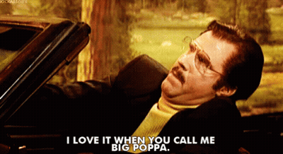 A Man With Glasses And A Mustache Is Sitting In A Car And Says I Love It When You Call Me Big Poppa GIF