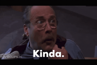 A Man With Glasses And A Mustache Is Smiling And The Word Kinda Is On The Screen GIF