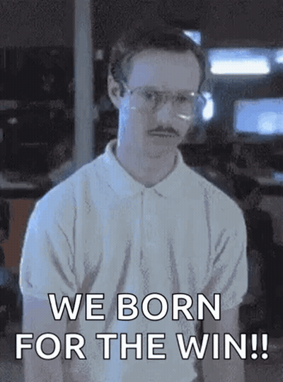 A Man With Glasses And A Mustache Is Standing In Front Of A Sign That Says `` We Born For The Win ! '' GIF