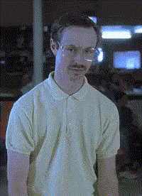 A Man With Glasses And A Mustache Is Wearing A White Polo Shirt . GIF