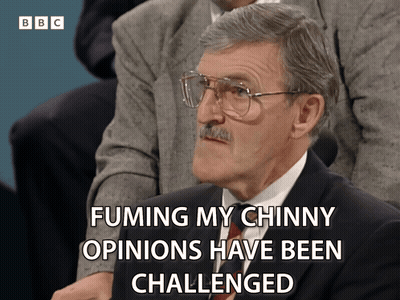 A Man With Glasses And A Mustache Says Fuming My Chinky Opinions Have Been Challenged GIF