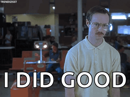 A Man With Glasses And A Mustache Says I Did Good In Front Of A Bowling Alley GIF