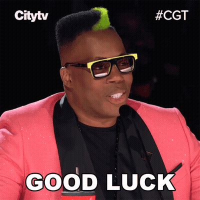 A Man With Glasses And A Pink Jacket Says " Good Luck " GIF