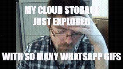 A Man With Glasses And A Plaid Shirt Holds His Hand To His Forehead With The Caption " My Cloud Storage Just Exploded GIF
