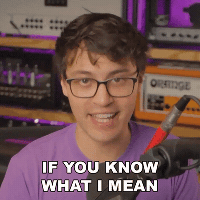 A Man With Glasses And A Purple Shirt Says " If You Know What I Mean " GIF