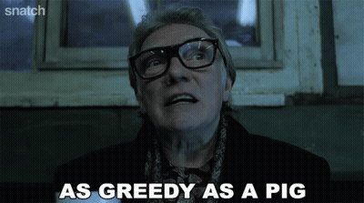 A Man With Glasses And A Scarf Says As Greedy As A Pig GIF