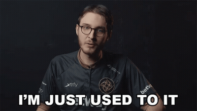 A Man With Glasses And A Shirt That Says I 'M Just Used To It On It GIF