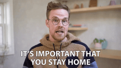 A Man With Glasses And A Sweater Says It 'S Important That You Stay Home GIF