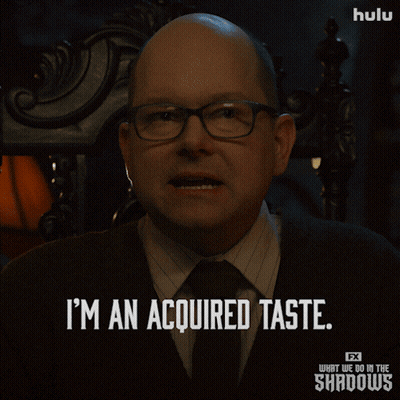 A Man With Glasses And A Tie Says I 'M An Acquired Taste GIF