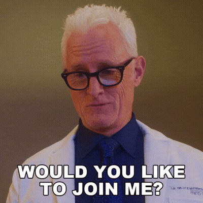 A Man With Glasses And A White Coat Says Would You Like To Join Me GIF