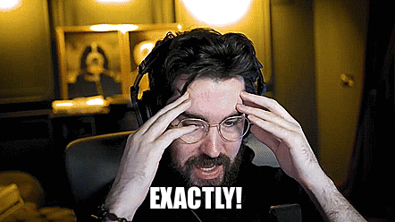 A Man With Glasses And Headphones Is Holding His Head And The Words Exactly Are Above Him GIF