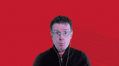A Man With Glasses And Headphones Says Wow In Front Of A Striped Background GIF