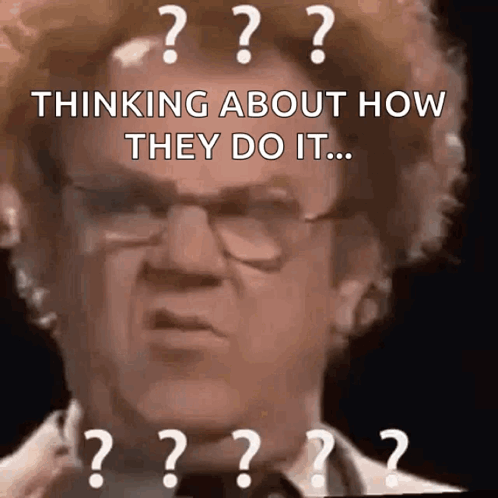 A Man With Glasses And Red Hair Is Thinking About How They Do It GIF