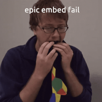 A Man With Glasses Eating Something With The Caption Epic Embedded Fail GIF