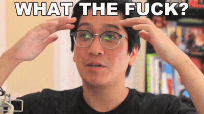 A Man With Glasses Has His Hands On His Head And The Words What The Fuck Are Above Him GIF