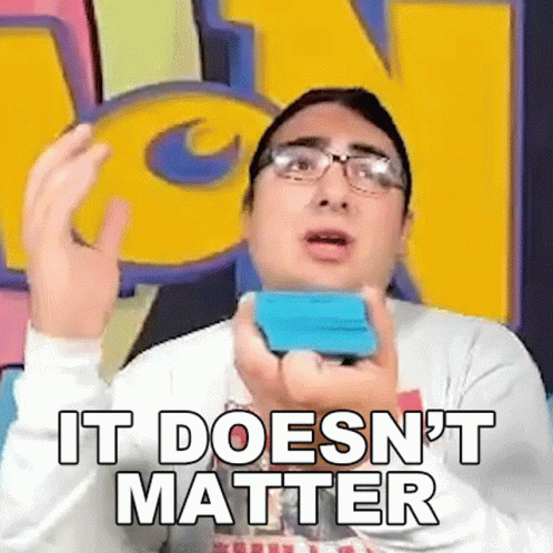 A Man With Glasses Is Holding A Cell Phone In His Hand And Saying `` It Doesn 'T Matter '' . GIF