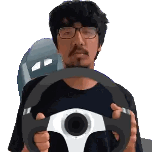 A Man With Glasses Is Holding A Steering Wheel In His Hands Sticker