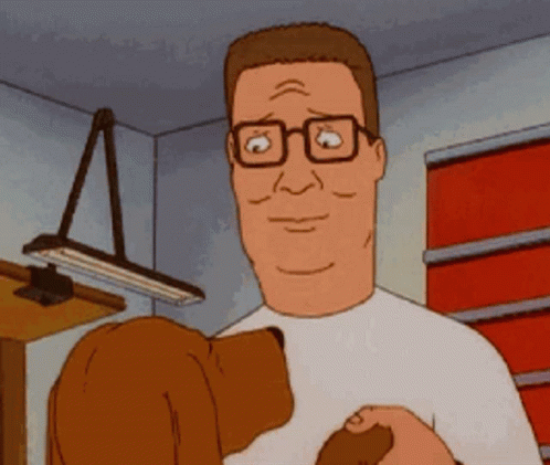 A Man With Glasses Is Holding A Stuffed Animal GIF