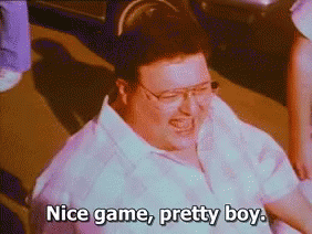 A Man With Glasses Is Laughing And Saying " Nice Game Pretty Boy " GIF