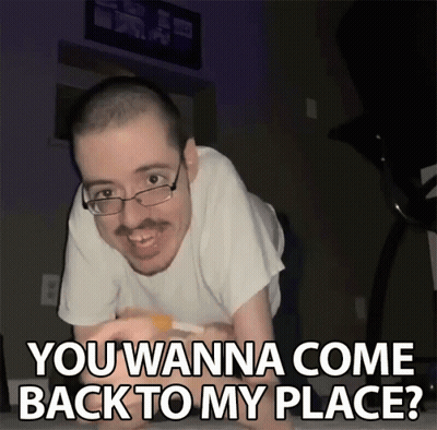 A Man With Glasses Is Laying On His Stomach With The Words " You Wanna Come Back To My Place " Above Him GIF