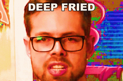 A Man With Glasses Is Making A Funny Face With The Words Deep Fried Written Above Him GIF