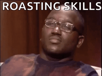 A Man With Glasses Is Making A Funny Face With The Words Roasting Skills Wack GIF