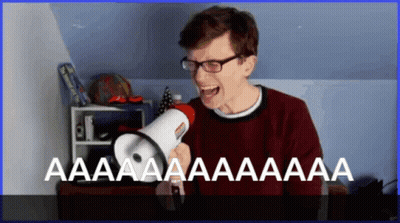 A Man With Glasses Is Screaming Into A Megaphone That Says Aa Aa Aa Aa Aa GIF