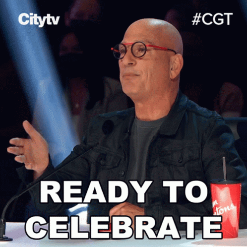 A Man With Glasses Is Sitting In Front Of A Mcdonald 'S Cup And Ready To Celebrate GIF